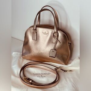 Rare Kate spade rose gold some softening of the leather.  No rips or tears.